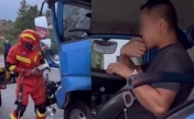 湖南一司机被困车内 淡定咬手手围观消防破拆救援自己
