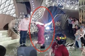 婚禮現(xiàn)場(chǎng)喜婆婆上臺(tái)表演才藝助興 倒立旗袍秀驚呆眾人