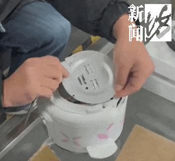 警方在电饭煲里拦截下800克黄金 成功阻止电诈