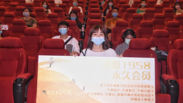 Chinese girl arrives first to newly reopened cinema, wins free movie tickets for life