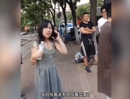 女子疑酒驾找男朋友顶包 “我怀孕四、五个月了，你敢动我？”一女子在出车祸后当街如是说道
