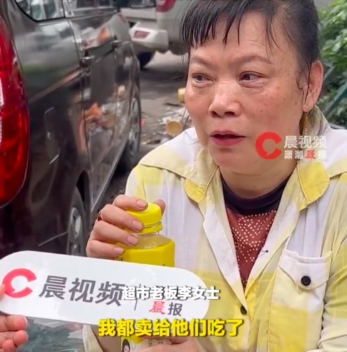 柳州震中一超市老板仍在坚守 矿泉水泡面给救援人员