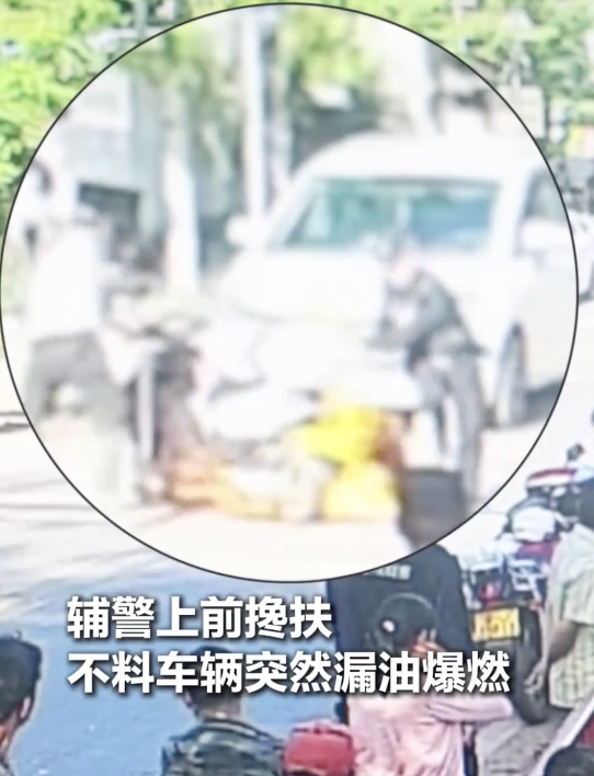 女子骑摩托车摔倒身上起火 警民合力扑救