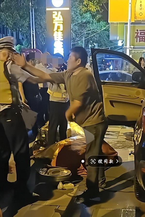 一醉驾车主强行冲卡还打警察 当地回应