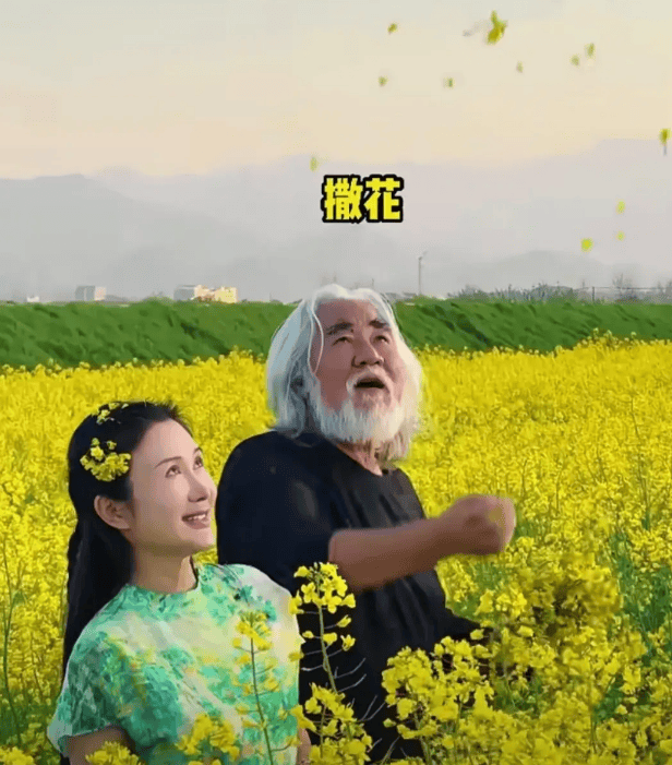 张纪中带怀孕妻子来油菜花田拍照再大的导演也要给老婆拍照