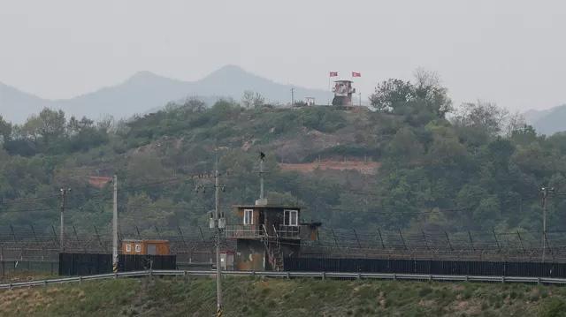韩称朝鲜士兵越线遭鸣枪警告 无意入侵，草丛遮视线所致
