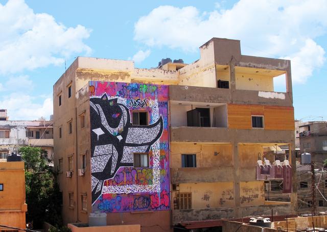 黎巴嫩艺术家用涂鸦呼唤和平与希望 绿带上的和平讯息