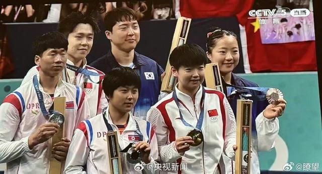 珍贵一幕！中朝韩3国运动员自拍 共叙奥运友情