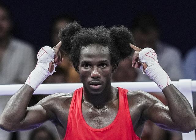 佛得角拳击选手为祖国赢得首枚奥运奖牌，因发型酷似米老鼠引发热议