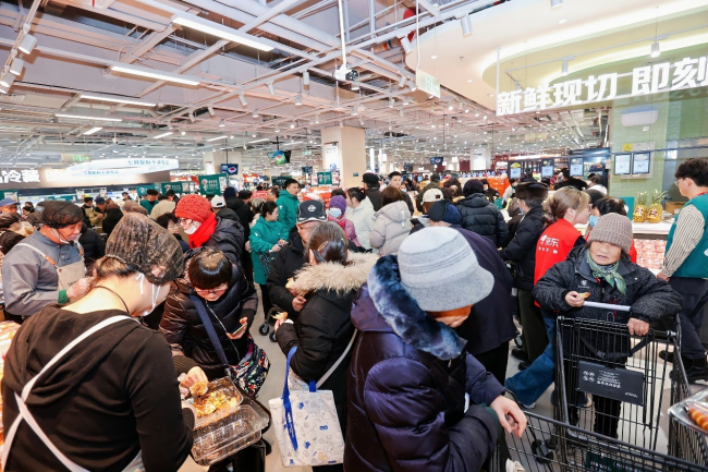 首日超3.5万人涌入,京东七鲜打造春运级开业现象