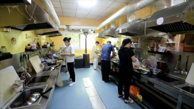 新华走笔丨“抗癌厨房”的正午时分