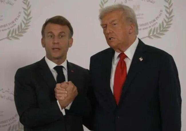 特朗普马克龙上演26秒握手 掰腕式较量再上演