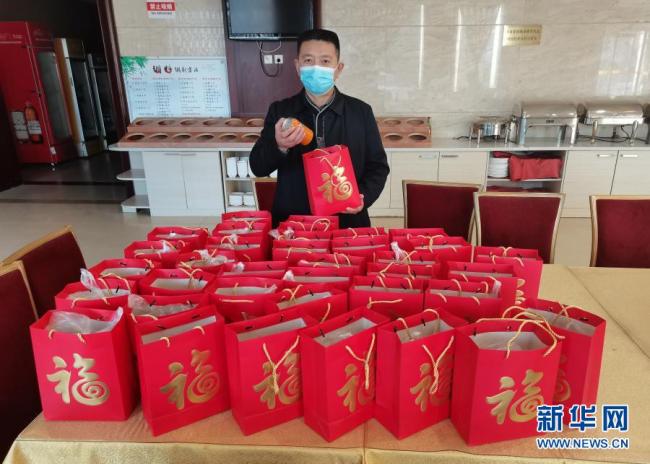 新春走基层|特写:异乡人,一家人!