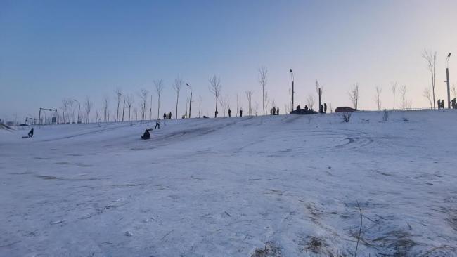 追光｜街头冰雪热彰显冬奥情