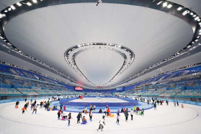 冰雪盛会铸经典 向着春天再出发——写在北京冬奥会开幕一周年之际
