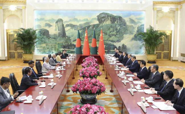習(xí)近平會見孟加拉國臨時政府首席顧問尤努斯