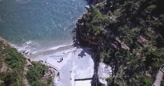 大连一公共沙滩被圈地改造成收费区 专项清理恢复公众开放