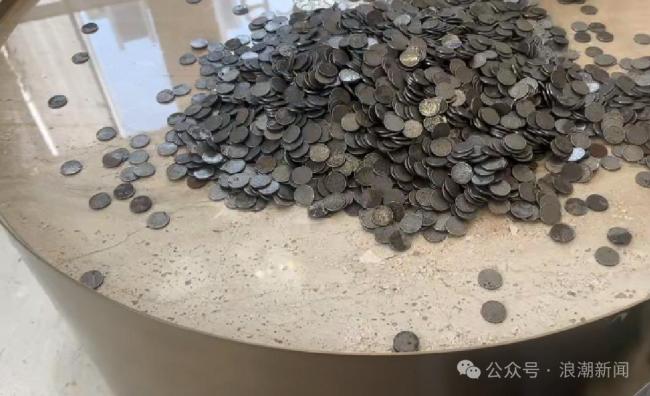 男子存2万枚硬币遭银行质疑拒收 合法来源仍难兑换