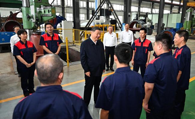 时政微观察丨集中力量办好自己的事