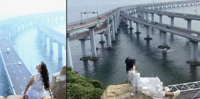 大连一观景台游客翻栏杆站悬崖拍照 安全隐患引热议
