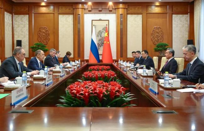 普京携庞大代表团访华背后的深意 深化中俄战略合作