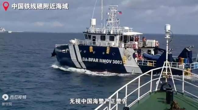 中国海警公布菲船只侵闯铁线礁视频 恶意擦碰被依法驱离！