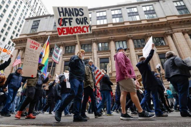 特朗普口风180度转变为哪般 现实压力下的妥协