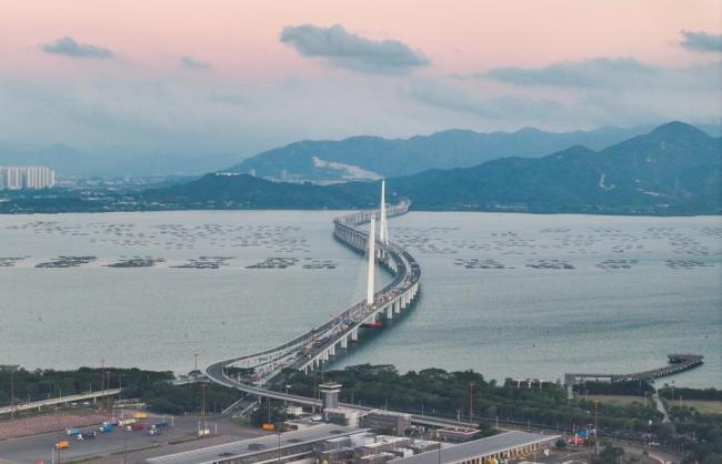 大看台|通讯:42.195公里,见深港情长