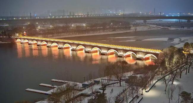 卢沟桥亮灯 古韵雪景添浪漫