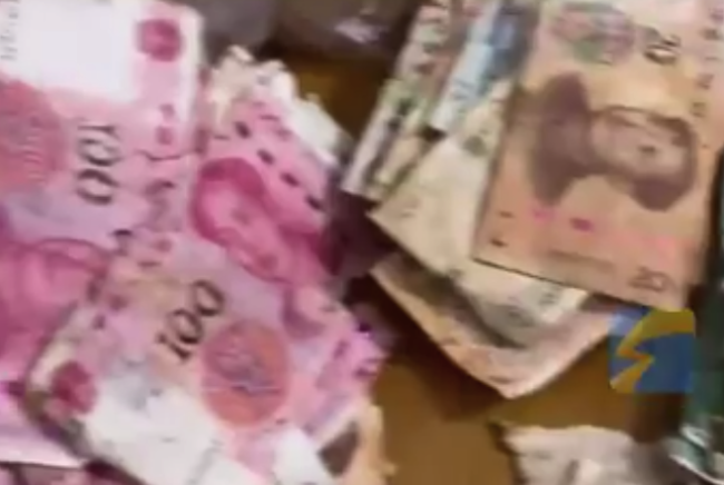 4万现金受潮损坏只换回1万7 家属：很伤心