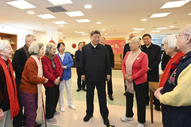 新華圖訊丨習(xí)近平春節(jié)前夕在北京看望慰問基層干部群眾