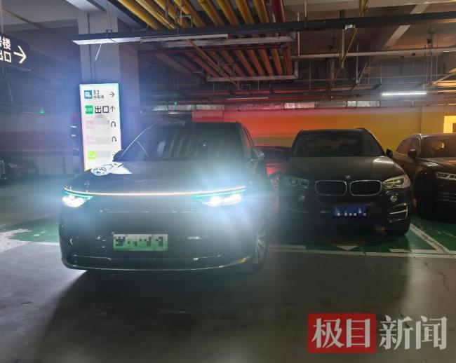记者调查新能源车“车大位小”停车难 车位缩水添烦恼