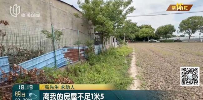 房屋開裂 男子帶女兒住集裝箱1年多 鄰居改旱地為水稻田引發(fā)