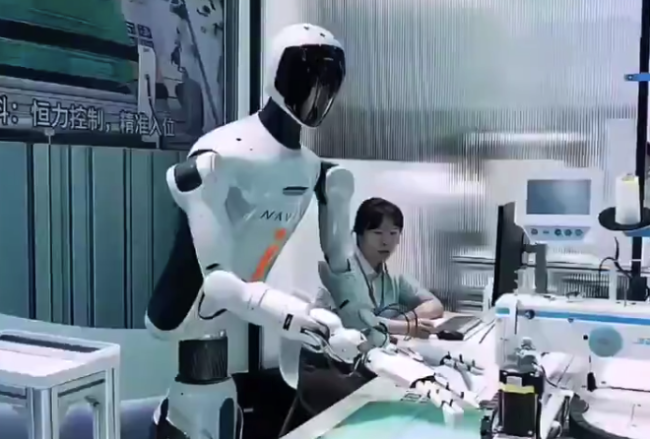 浙江企业机器人都能制衣了 