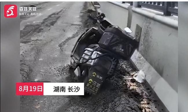 城管回应通车一年多道路破损严重