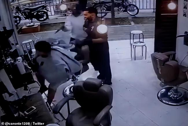 哥伦比亚男子街上遭枪击倒地命悬一线 街头枪杀频发引关注